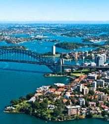 Bridge, ocean and the establishments surrounding it.