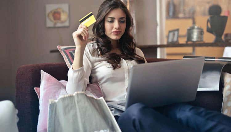 Woman holding a credit card