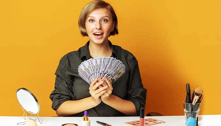 Woman holding money