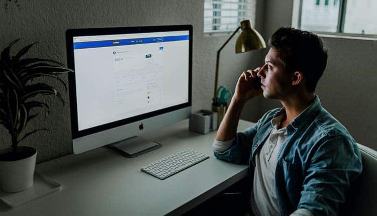 Man staring at the computer