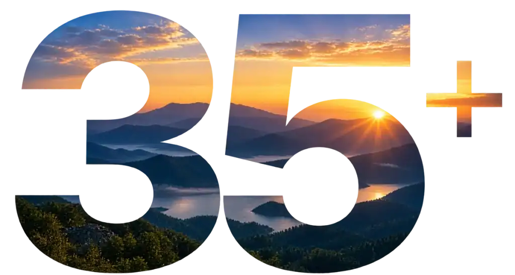 The text “35+” filled with an image of a sunrise over a mountain lake.
