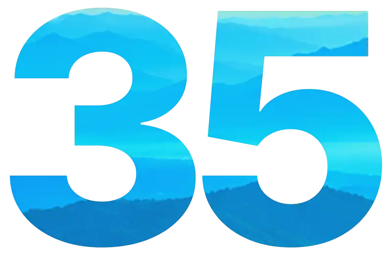 The number 35 filled with a blue landscape of mountain silhouettes.